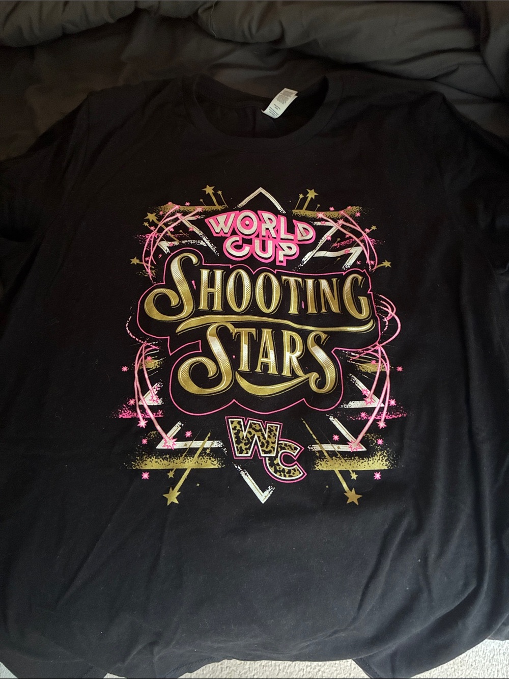 Bella Canvas Black Tee with Gold and Pink "World Cup Shooting Stars" Graphic